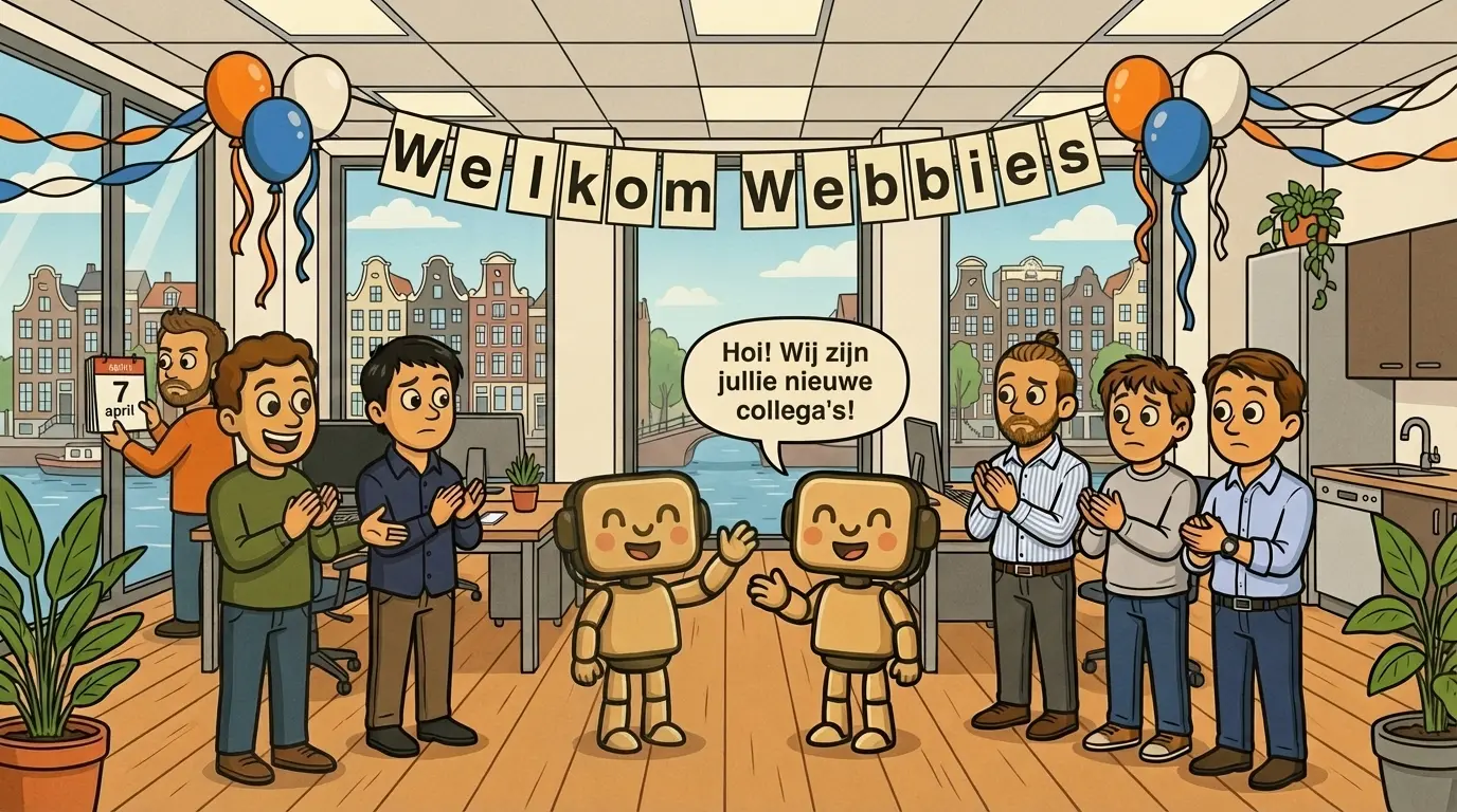 Twee robots worden verwelkomd op kantoor met spandoek 